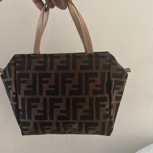 Cute mini bag, cute for a date or going out. Small but u can fit your phone